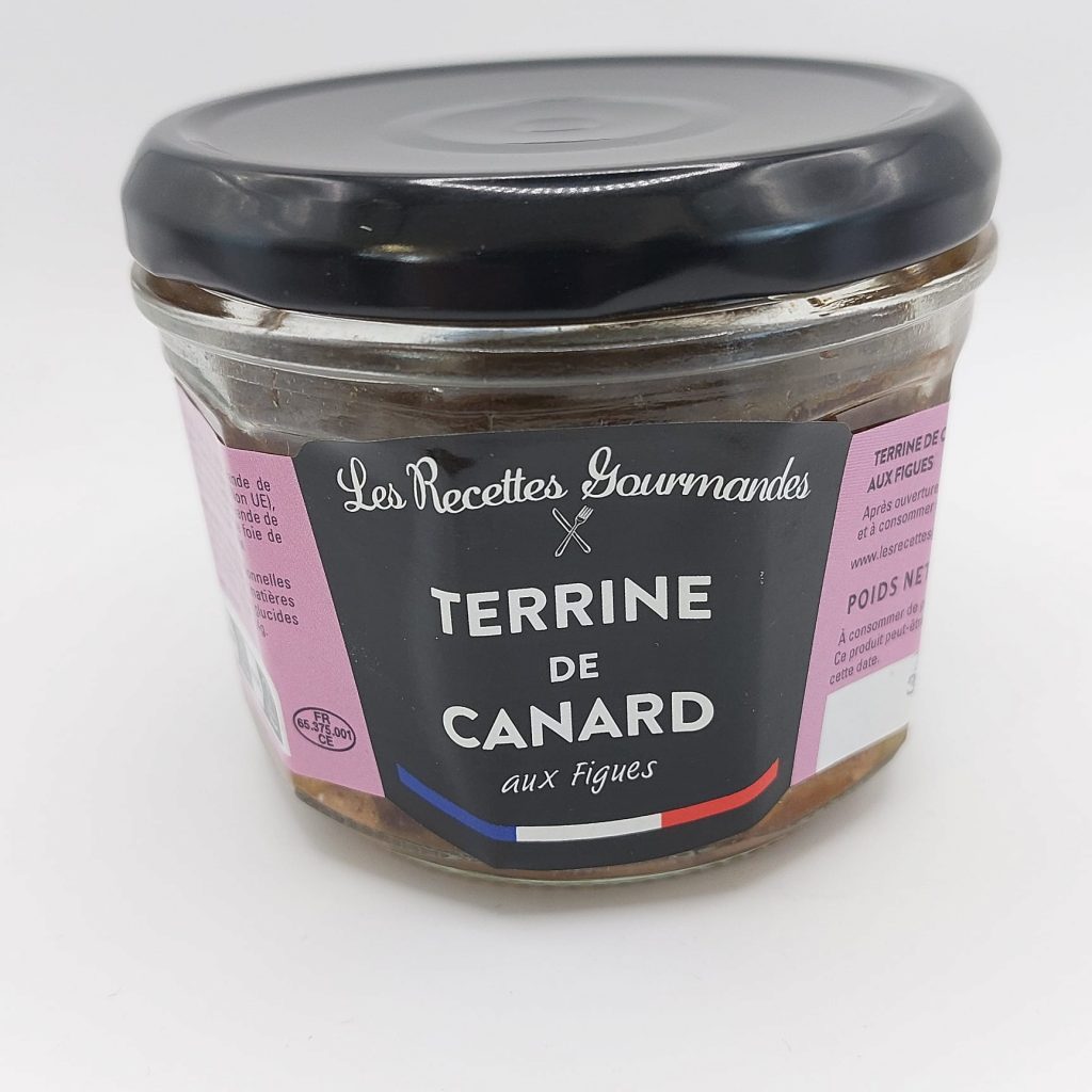 Terrine de canard aux figues, spécialité charcutière sucrée-salée.