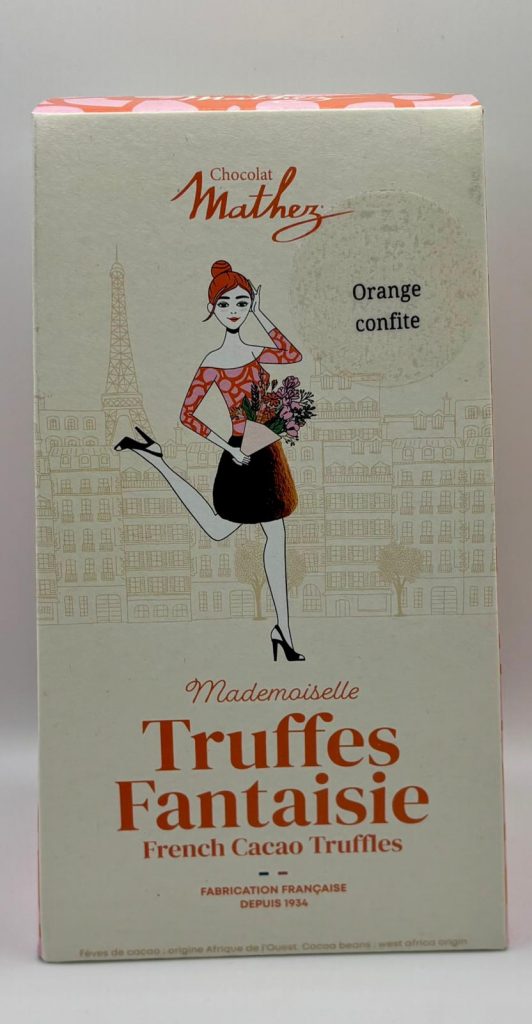 Truffes fantaisie au chocolat aux écorces d’orange confite de la marque Chocolat Mathez.